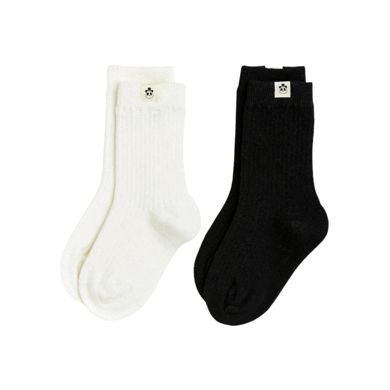 White and black socks on a white background