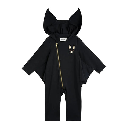 A black hooded one-piece jumpsuit with bat-wing sleeves, a front zipper, and a small gold fox face graphic on the left chest, displayed on a light gray background.