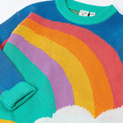 A colorful knit crewneck sweater featuring a rainbow design with blue, teal, pink, orange, purple, yellow, and white sections, including a folded cuff and ribbed trim.