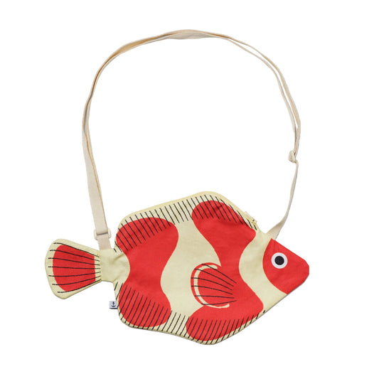 Fish-shaped bag with red and beige design on a white background