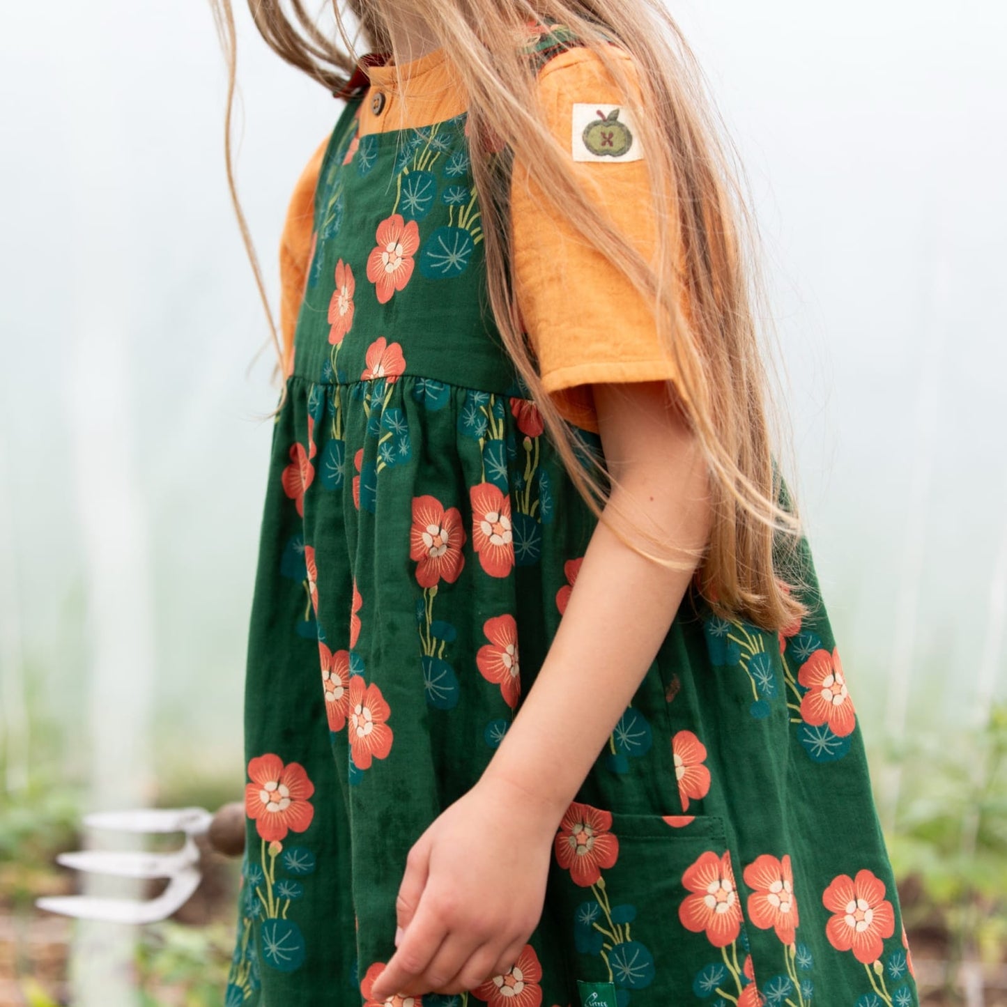 Little Green Radicals Orange Blooms Reversible Pinny Dress