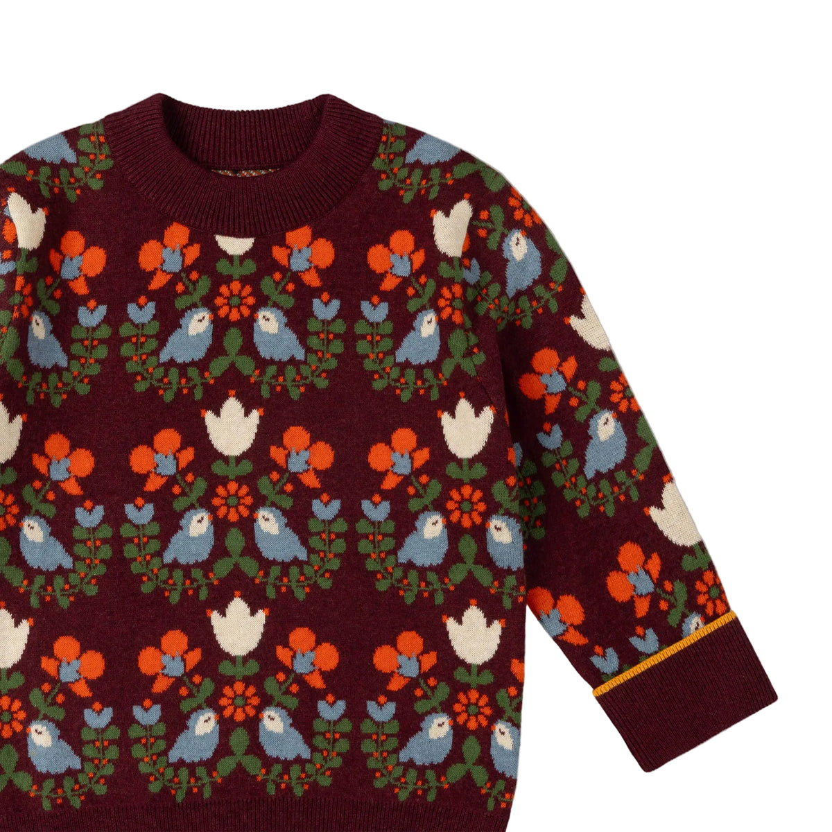 Maroon sweater with colorful bird and floral pattern on a white background