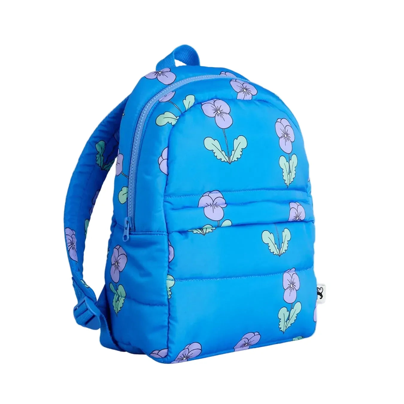 A bright blue puffer backpack with a pattern of purple flowers and green leaves, shown against a light gray background.