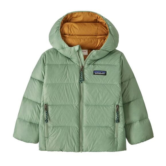 Green puffer jacket with a visible brand logo on a white background